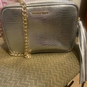 Silver Victoria secret handbag with gold chain